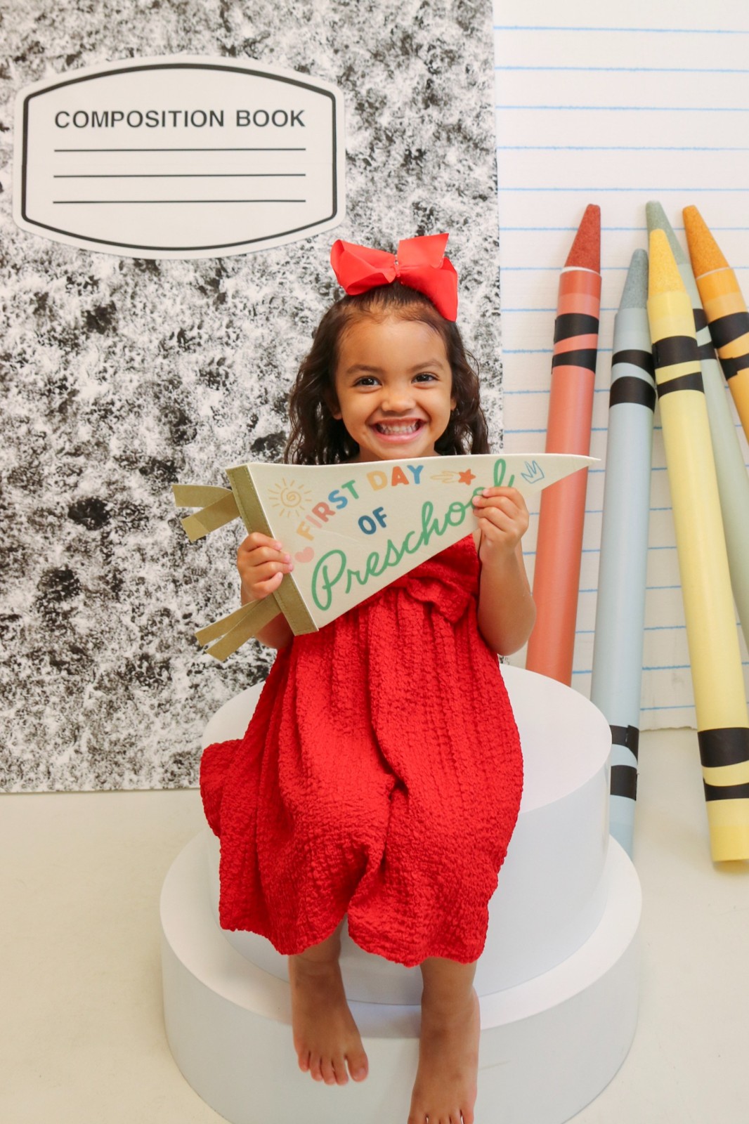 Back-to-school portrait with a giant crayon